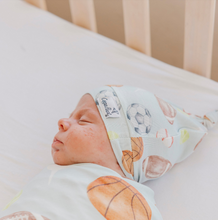 Load image into Gallery viewer, COPPER PEARL® Top Knot Hat - Sports Medley